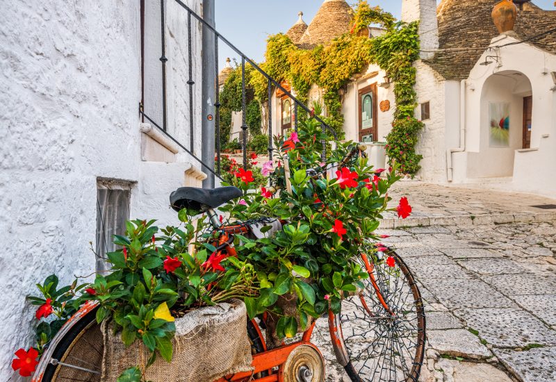 Streets of Alberobello, Italy with the historic Trullo houses.